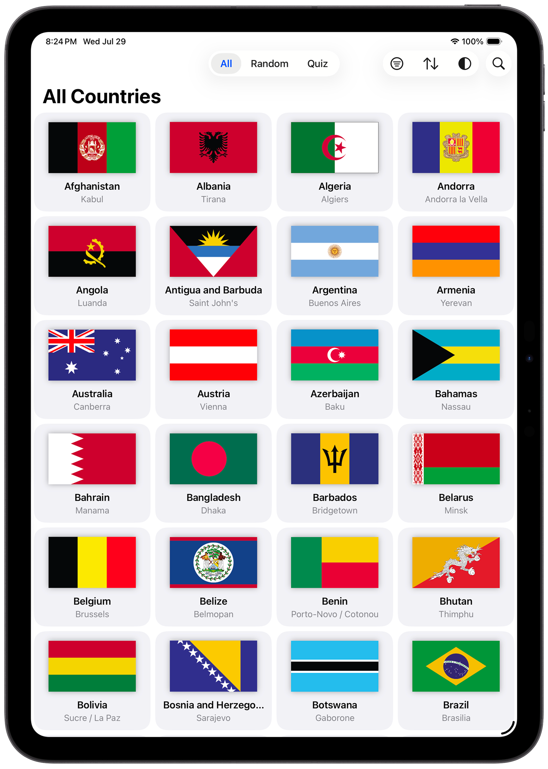 GlobeTrotter on iPad showing countries as a grid of cards with flags.